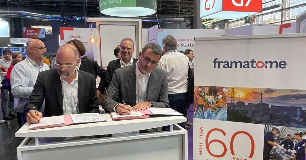François Cuny, directeur général délégué à l'innovation de l'Inria, et Stéphane Bugat, directeur R&D Framatome, signent ensemble le partenariat